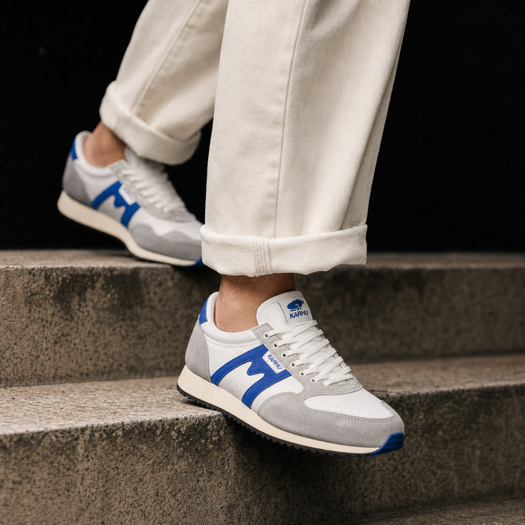 On-foot editorial crop of cobalt-accented runner